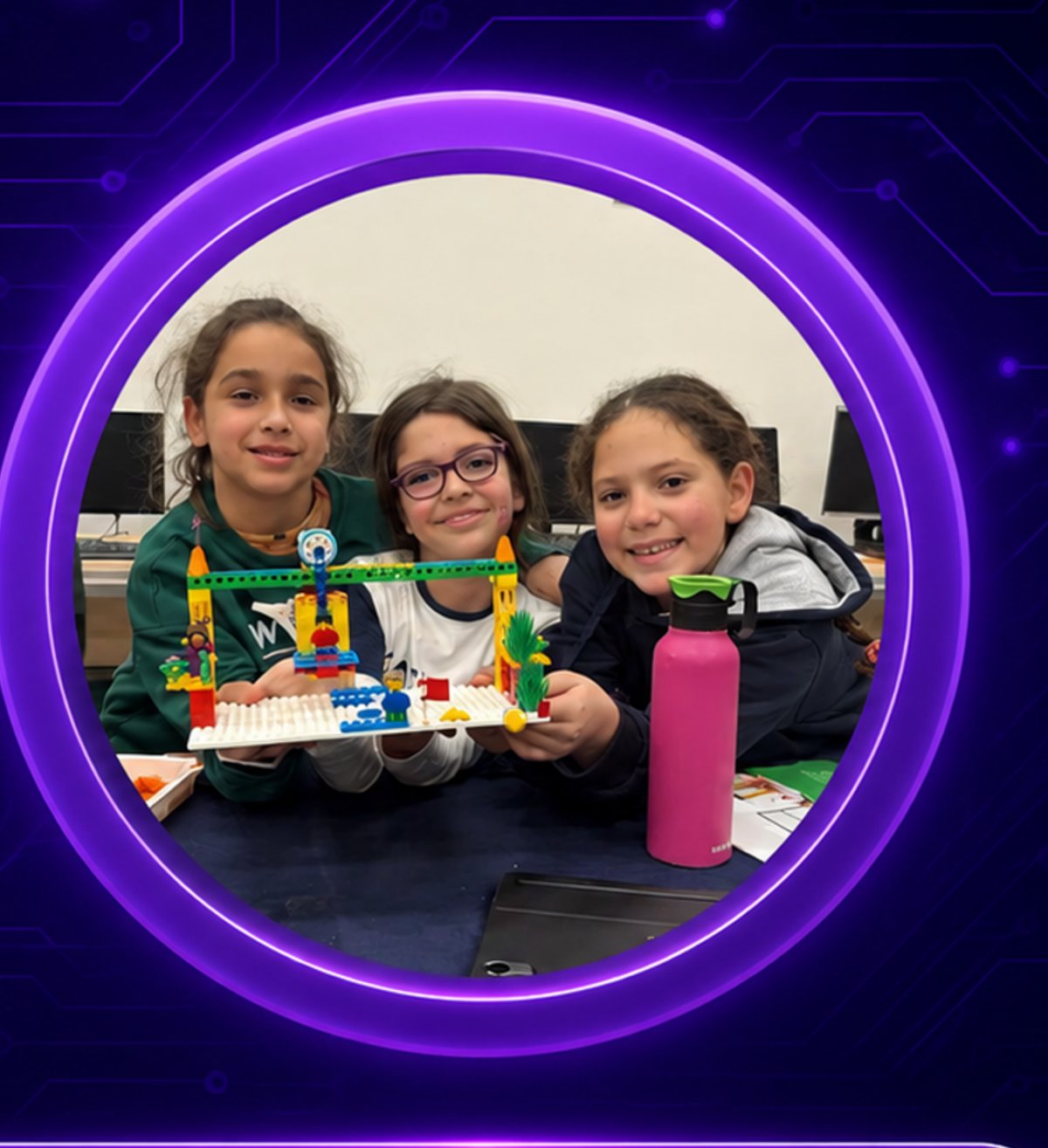 StarKiddo students building with LEGO robotics kits